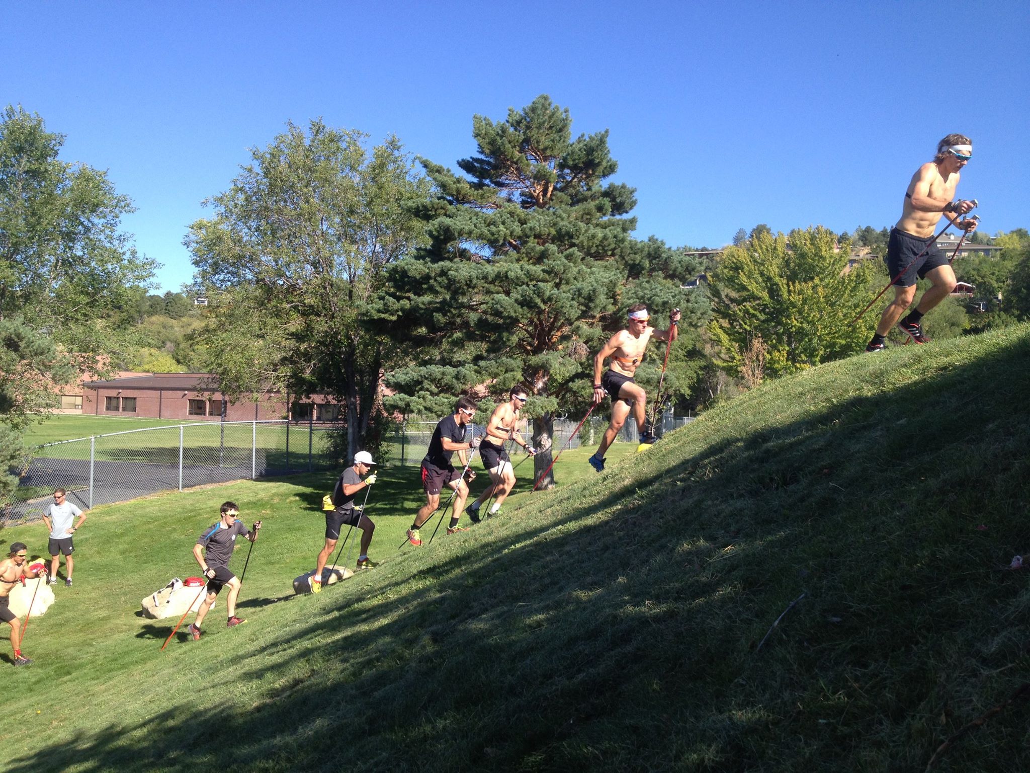 Coaches picked a steep hill for a joint ski bounding exercise with the cross-nation and biathlon teams. (Photograph: Matthias Ahrens)