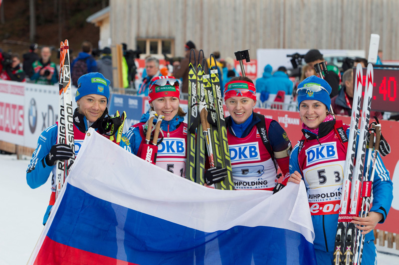 Irina Starykh (far appropriate) celebrates with the Russian staff after their IBU Globe Cup biathlon relay victory in Ruhpolding, Germany, in January. The outcome is amongst those which will be voided with Starykh's doping ban, from a sample collected in December. (Photograph: Fischer / Nordic Concentrate.)