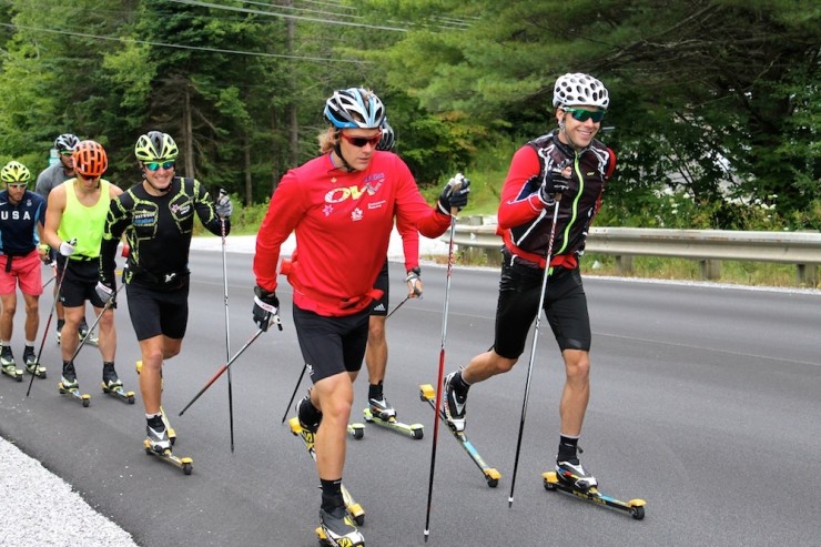 Canadians Alex Harvey (r), Devon Kershaw (front left) lead six other individuals, such as Ivan Babikov (third from l), Kris Freeman (second from l) and Andy Newell (l), during a combi over-distance rollerski near Stratton, Vt.