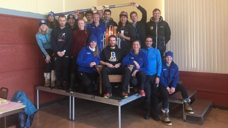 The University of Alaska Fairbanks ski team poses with the trophy for the Alaska Nordic Cup at Birch Hill Ski Area in Fairbanks, Alaska, on Nov. 20, 2016. (Photo: Nick Crawford/UAF Athletics)