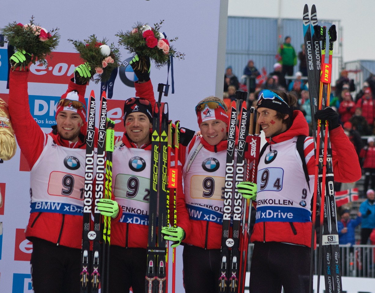 The Canadian men's team (l-r) Christian Gow, Nathan Smith, Scott Gow, and Brendan Green celebrate bronze in the men's 4 x 7.five k relay at 2016 Globe Championships in Oslo, Norway. (Photo: JoJo Baldus)