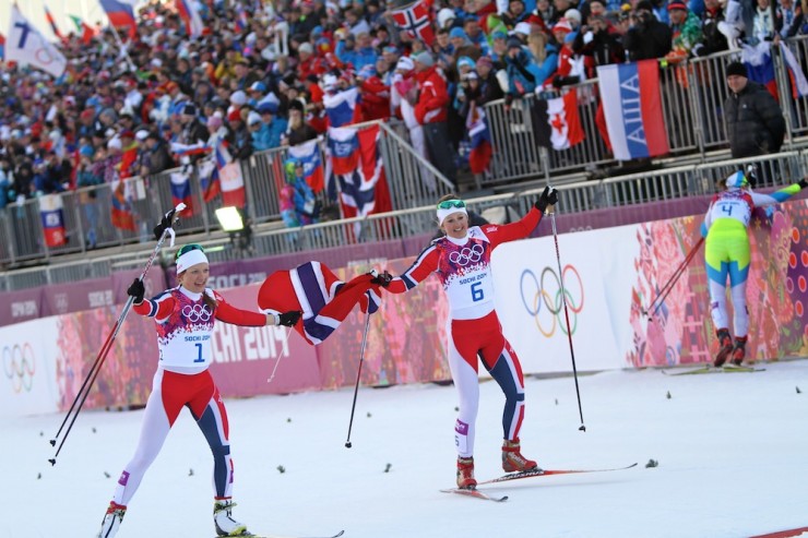 Norwegian teammates and close friends Maiken Caspersen Falla (l) and Ingvild Flugstad Østberg celebrate gold and silver, respectively, in Tuesday's Olympic skate sprint in Sochi, Russia.