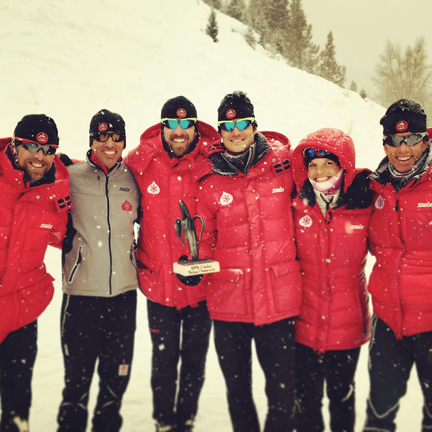 Stuber and Cook (second and third from right) with AVSC staff at a competition this winter. (Courtesy photo)