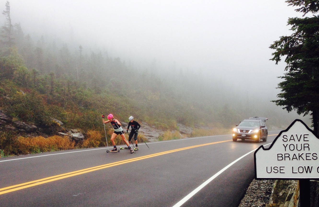 Mary Rose (SVSEF) leads US Biathlon's Annelies Cook up the Whiteface Mountain toll street for the duration of the yearly Climb to the Castle. Rose won and Cook completed second, 32 seconds later on. (Photo: Tim Cowan)