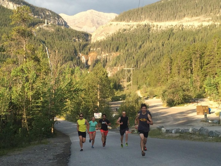 WinSport Junior XC Group athletes (from left to correct) Peter Hicks, Morgan Rogers, Jasper Mackenzie, Eric Byram, Ewan Craig, and Alec Stapff push up a hill on Spray Lakes Road in Canmore, Alberta, in the course of an intensity workout following a prolonged block of volume. (Photo: Eric de Nys)