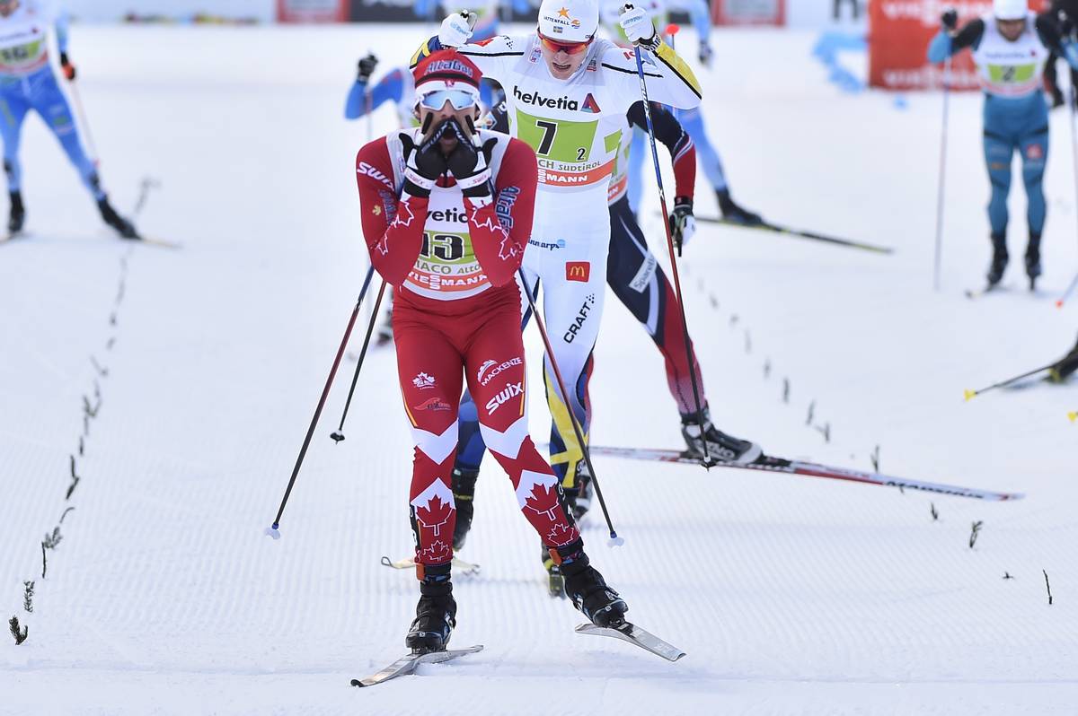 Respect the power of the mustache: Canadian Alex Harvey celebrates as he anchors his team to a World Cup freestyle team sprint win on Sunday in Toblach, Italy. (Photo: Salomon/Nordic Focus)