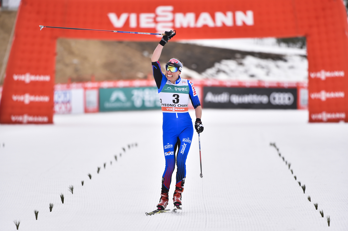 Poland's Justyna Kowalczyk winning her first World Cup in three years on Saturday, the women's 15 k skiathlon at in PyeongChang, South Korea. (Photo: Fischer/Nordic Focus)