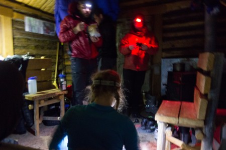 The gang in the public use cabin in Chisana. Photo: Seth Adams