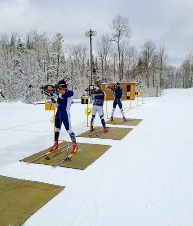 Left to right: MWSC Biathletes Brendan Cyr, Mikaela Paluszek, and elite athlete Russell Currier during a head-to-head shooting workout in late December at the Fort Kent Outdoor Center in Fort Kent, Maine, Dec., 2015. (Courtesy photo)