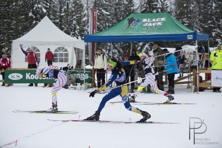 Emily Nishikawa (l) edges Olivia Bouffard-Nesbitt (c) and Heidi Widmer (r) in the women's one.four k skate sprint last at the Black Jack NorAm on Dec. 14 in Rossland, B.C. Widmer was 2nd and Bouffard-Nesbitt placed third. (Photograph: Shelley Peachell/Peachell Photography, http://peachellphotography.com/)