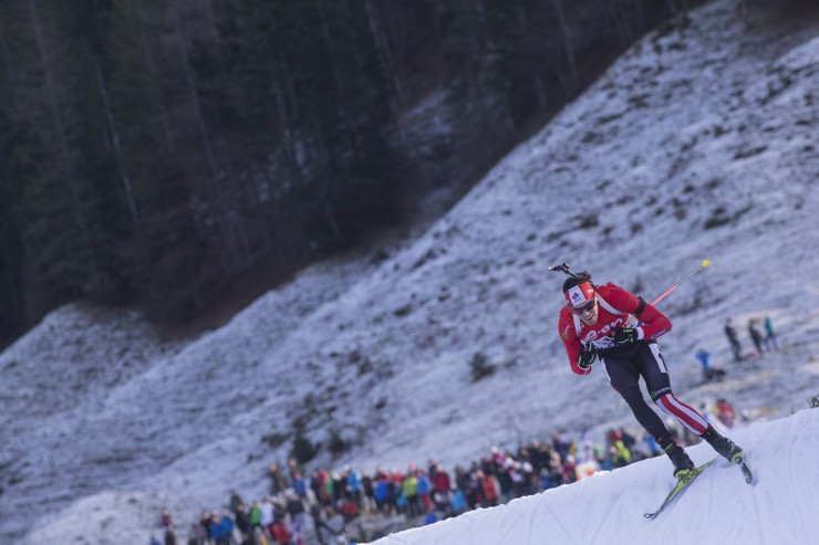 Nathan Smith of Canada skates his way to 18th at the IBU Globe Cup pursuit in Hochfilzen, Austria. (Photograph: Fischer/NordicFocus)