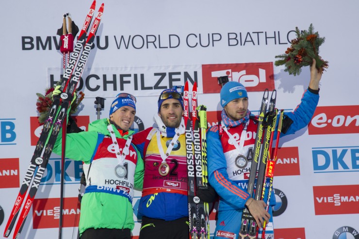 After what runner-up Simon Schempp (l) of Germany referred to as a &quotpsycho race&quot Schempp, winner Martin Fourcade (c) of France, and Russia's Anton Shipulin (r) shared the pursuit podium at the IBU Globe Cup in Hochfilzen, Austria. (Photograph: Fischer/NordicFocus)