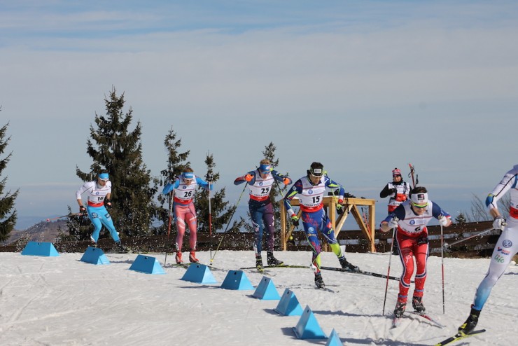 American Logan Hanneman (c) racing to third in his quarterfinal of the freestyle sprint at U23 Globe Championships in Rasnov, Romania. He ended the day 15th all round. (Photograph: Pete Leonard)